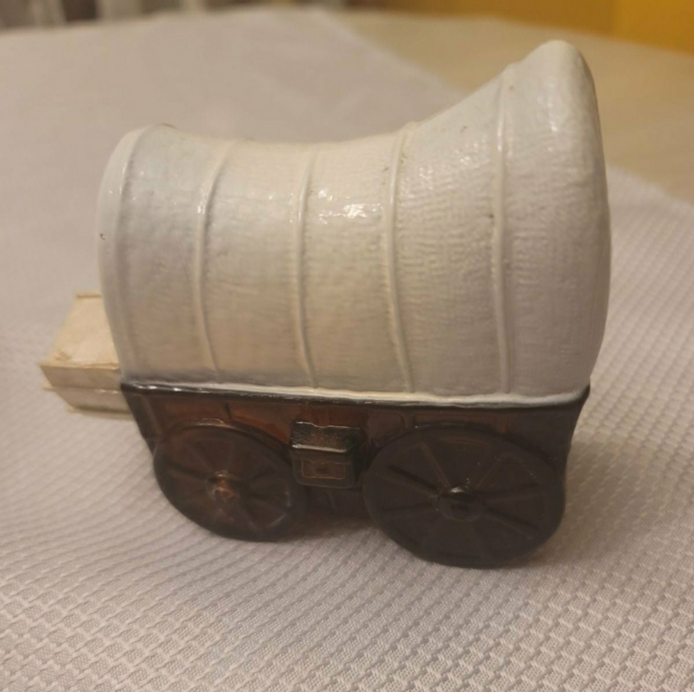 !**Avon covered wagon bottle. Empty